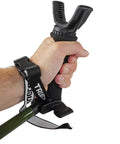 Hand holding Hip Shot Crossbow Shooting Rest Lightweight Stable Portable Telescopic Versatile Support with wrist strap visible.
