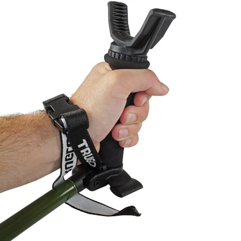 Hand holding Hip Shot Crossbow Shooting Rest Lightweight Stable Portable Telescopic Versatile Support with wrist strap visible.