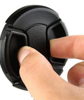 Close-up of hand using 5 Pack 58mm Lens Cap Bundle Front Filter Snap On Pinch Cap Protector Cover For DSLR And SLR Camera Lenses