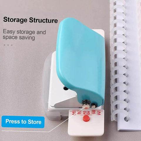 Beast 6 Hole Paper Punch Handheld Portable Puncher For A4 A5 B5 Notebooks And Planners, compact blue model on desk
