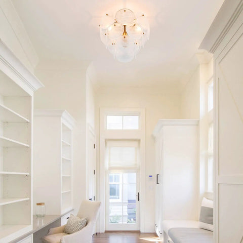 Modern Flush Mount Glass Ceiling Light In Gold Finish, 4 Light Vintage Chandelier illuminating hallway with geometric shades.