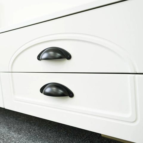 Two white kitchen drawers featuring 10 Pack 3 Inch Matte Black Cabinet Cup Pulls Solid Zinc Alloy Build.
