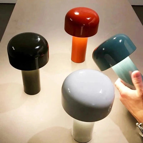 Assorted colors of Cordless USB Rechargeable Desk Lamp With Touch Dimming, Mushroom Night Light, 3 Color Temp Modes, hand operating.