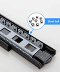 Soft Close Three-Section Drawer Slides With Ball Bearing Runners Black Cabinet Drawer Rails close-up view with steel balls
