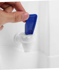 Hand pressing blue tap of Compact Water Jug Dispenser Stand For Office Use Go To Hydration Station, Mini Portable Cooler