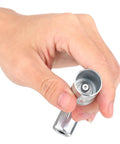 Hand holding 90 Degree Grease Coupler And Gun Adapter Two Pack With 3 Jaw Swivel Right Fittings For No Spill Greasing Quick Lock And Release