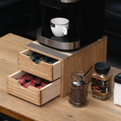 Double Tier Wooden Coffee Maker Stand With Pull Out Storage Drawer For K Cups And Capsules Countertop Brew Organizer Rack arrangement with coffee pods and brewer.