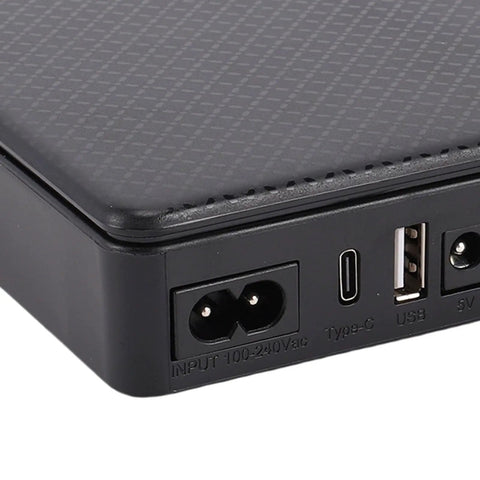 Mini Ups Battery Backup 16000Mah Power Supply For Routers And Modems US Plug back view showing ports and design features.