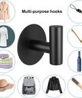 Self-Adhesive Rust-Resistant Stainless Steel Coat Hooks Heavy-Duty No-Drill Wall Hangers for Towels Robes Coats Hats Black 2 Pack Ideal for Bathrooms Kitchens and Hotels shown with various items