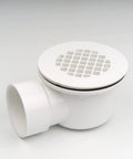 Low Profile Shower Base Drain With Perforated Strainer 1.5 Inch Side Outlet PVC Drain shown with top view and side outlet