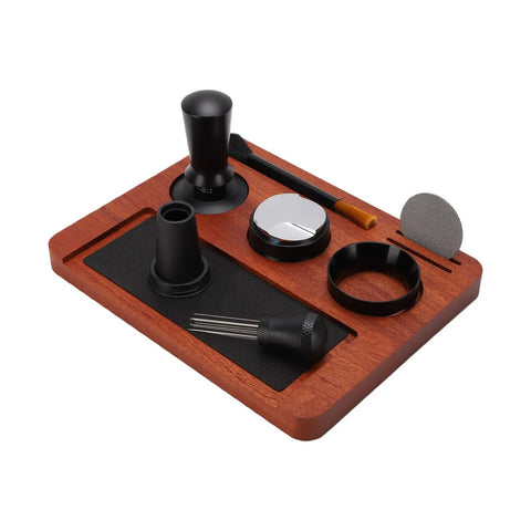 Solid Wood Espresso Tamper Station With Silicone Mat And Seven Piece Barista Gear featuring black tools on a hardwood base.