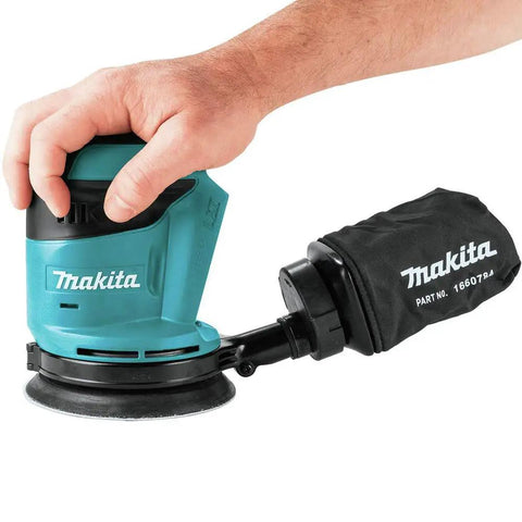 Person using Cordless 5 Inch Random Orbit Sander 18V LXT With Three Speed Settings 7000 9500 11000 OPM Large One Eighth Inch Orbit