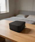 Rugged Oxford Cloth Telescope Accessory Case With Removable Dividers for eyepieces and optics on a wooden table
