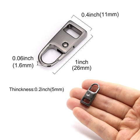 4 Pack Zipper Pull Tabs Replacement Metal Zipper Handles For Luggage Suitcases Jackets Backpacks Coats Boots Gunmetal Black And Gold Easy No Fuss Zip Repair Kit, individual zipper pull tab size comparison to hand, showcasing dimensions and zinc alloy material.