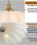 Zobawlks Pendant Lights Kitchen Island: Mid-Century Hanging Light with gold hardware and milk glass floral shade detail.