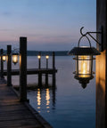 2 Pack Solar Lanterns For Outdoor Spaces With Wall Mount And Hanging Options, Warm White Edison Bulb Lights by a lake