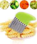 Green plastic-handle crinkle cutter with stainless steel blade for potatoes and carrots