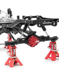 RC crawler chassis on jack stands with 4-Pack 100mm Aluminum RC Shock Absorbers Dampers For 1/10 RC Crawlers TRX4 SCX10 D90 D110 HPI HSP Upgrade Parts With Smooth Damping And Long Durability installed, showing suspension setup.