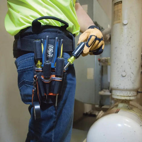 Tradesman Pro Maintenance Tool Pouch With Nine Pockets And Tape Thong 2 Inch Tunnel Belt Loop Electrician Holster worn on worker