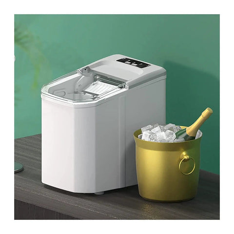 Effortless Portable Ice Cube Maker No Stress Countertop Machine chilling ice cubes beside a gold bucket and champagne bottle.