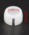 Close-up of white bushing end clip from Land Rover Range Rover Evoque Shift Cable Replacement Kit for 2011-2019 Manual Transmission