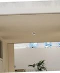 Premium Stainless Steel Fire Sprinkler Head Deflector mounted on a ceiling in a modern space, offering protection from damage.