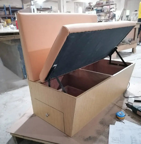 Bench Seat Hinges And Lift Spring Set For Bed Boxes And Chests, Pull Down Storage Lids, showing open seat storage in workshop