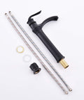 Components of 16 X 12 Inch Black And White Marble Vessel Sink And Faucet Combo, featuring sleek black faucet with connecting hoses.