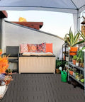 Interlocking Patio Deck Tiles 12x12 Inch Square Composite Plastic Outdoor Flooring for Balcony with plants and seating area