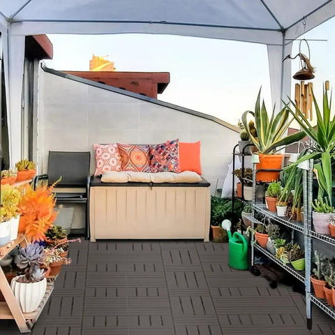 Interlocking Patio Deck Tiles 12x12 Inch Square Composite Plastic Outdoor Flooring for Balcony with plants and seating area