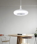 Hilitand E27 Ceiling Fan Light 4 in 1 Stepless Dimming LED Fan (Negative) hanging above a wooden table with chairs.