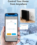 Person holding smartphone showing app control for Real Time Energy Monitoring Smart Plug With WiFi and Bluetooth connected to heater.