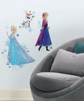 Disney Frozen Anna Elsa and Olaf Peel and Stick Giant Wall Decals Set on kid's room wall with chair, colorful figures, made in USA.
