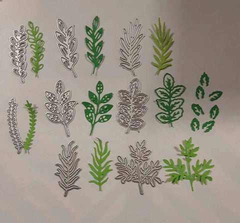 Eight Piece Leaf Metal Die Cuts Set For Scrapbooking And Card Making, showing diverse floral designs in green and silver, 9.7 by 10.9 cm.