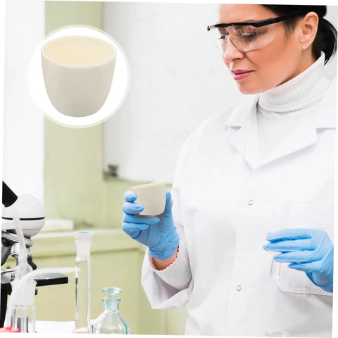 Scientist holding white ceramic crucible in lab, inset shows close-up of Graphite Lab Crucibles For Casting And Refining, Heavy Duty Reusable Crucibles For Copper And Metal Smelting, Aluminum Oxide White, Durable Laboratory Cup Pots For Smelting And General Laboratory Use.