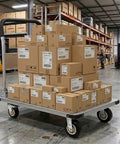 2600 Pound Capacity Steel Platform Cart With 43 By 26 Inch Flatbed Heavy Duty Industrial Moving Dolly With 6 Inch Fixed And Swivel Brake Wheels A Real Warehouse Workhorse For Inventory Tools And Equipment, loaded with boxes in a warehouse