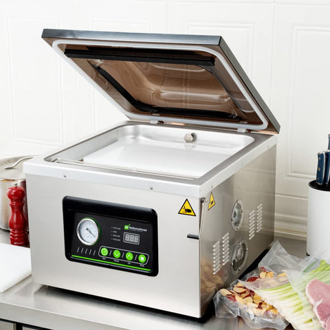 Pro Grade Chamber Vacuum Sealer Packs A Solid Punch With Sturdy 16 Inch Seal Bar And Whisper Quiet Motor on kitchen counter.