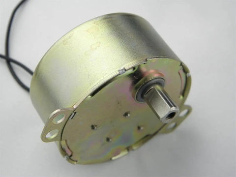 TYD-50 Small Synchronous Gear Motor 110V AC 5-6 RPM CCW with 11mm flush shaft, close-up view showing compact gearbox