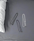 Awesome Adjustable Spring Stopper Drawstring Kit With Plastic Toggles, End Caps, And Threader Tool For Quick Hoodie Repair And Bag Cord Lock Replacement Fixing Pants Waistband Fit Like A Champ. Three plastic drawstrings on gray surface