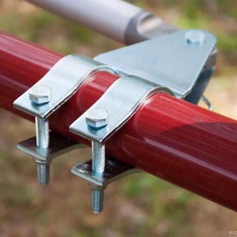 Universal Tube Gate Bracket Kit For Automatic Gate Opener Systems in stainless steel on red tube, side view