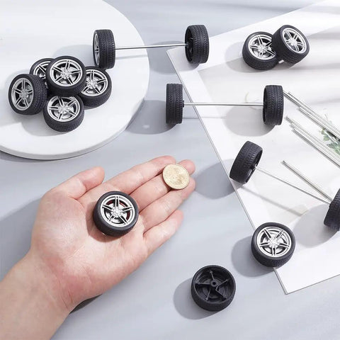Rad 16 Pack Toy Car Wheels Set With 8 Shaft Axles for RC Cars, showing wheels and axles on a table, one wheel in hand.