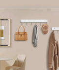 Two Pack Wall Mount Coat Rack With 12 Rotating 180 Degree Hooks 14.6 Inch Rustproof Wooden Entryway Organizer In White Space Saving Hanger used in a living room