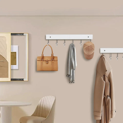 Two Pack Wall Mount Coat Rack With 12 Rotating 180 Degree Hooks 14.6 Inch Rustproof Wooden Entryway Organizer In White Space Saving Hanger used in a living room