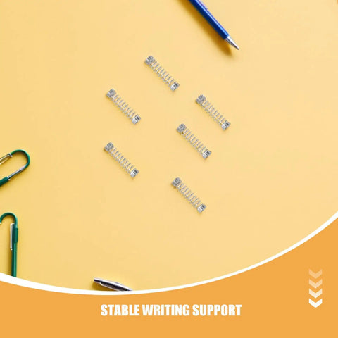Top Notch 100 Piece Stainless Steel Compression Springs Kit For DIY Fixes And Repair Projects Featuring Snappy Pen Return Technology That Guarantees Smooth Writing Flow Every Single Time With Rust Resistant Metal Mini Springs You Can Count On, stainless steel pen springs on yellow background