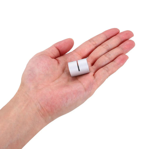 Hand holding one piece of Two Pack 5Mm To 5Mm Aluminum Shaft Coupling Connector 25Mm Length Rigid Joint For Motors 3D Printer DIY Robot Projects