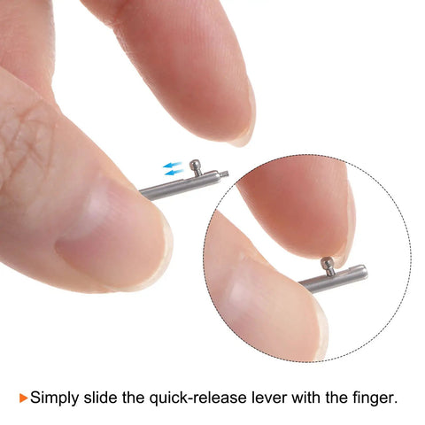 Close-up of fingers sliding the quick-release lever on a stainless steel pin from the 10 Pack Quick Release Spring Bar Pins For 22mm Watch Bands Stainless Steel One Point Eight Millimeter Diameter Replacement Link Pins Lugs Fast Strap Swaps For All Standard Watches.