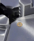 Close-up of Heavy Duty 5 Inch 3 Jaw Lathe Chuck Plain Back With Wrench Includes Two Sets Of Hard Jaws Internal And External