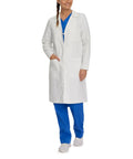 Model wearing Womens Knot Button Lab Coat 36 And A Quarter Inch White Work Ready Scrub Coat With Fabric Knot Closure Missy Fit