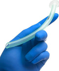 Hand wearing blue nitrile glove holding a 28FR NPA from the Deluxe Pro Grade Nasopharyngeal Airway Kit With Six NPAs In 22 Fr 24 Fr 26 Fr 28 Fr 30 Fr And 32 Fr Sizes Plus Lubricating Jelly Cleansing Wipes And Nitrile Gloves Sterile Latex Free Medical Essentials All In One