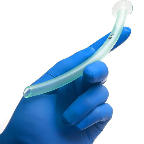 Hand wearing blue nitrile glove holding a 28FR NPA from the Deluxe Pro Grade Nasopharyngeal Airway Kit With Six NPAs In 22 Fr 24 Fr 26 Fr 28 Fr 30 Fr And 32 Fr Sizes Plus Lubricating Jelly Cleansing Wipes And Nitrile Gloves Sterile Latex Free Medical Essentials All In One